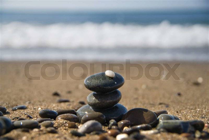 Stones and water wave, stock photo
