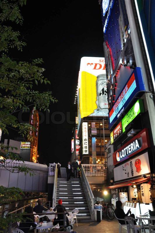 OSAKA, JAPAN - OCT 23: People visit famous Dotonbori street on October 23, 2012 in Osaka, Japan. According to Tripadvisor Dotonbori is the 3rd best attraction to visit in Osaka. , stock photo