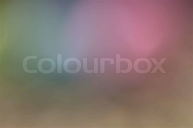Blurred image of Colorful Easter Eggs, Green,Blue and Rose background, stock photo