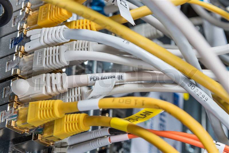 Close-up of network hub and ethernet cables, stock photo