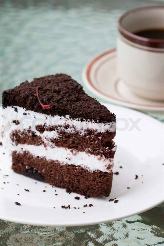 Cup of coffee and delicious chocolate cake, stock photo