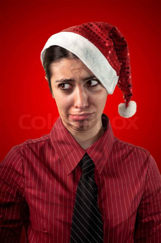 Sad christmas business girl on red background, stock photo