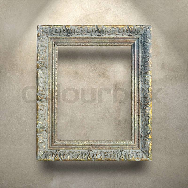 Luxury antique frame on concrete wall, stock photo