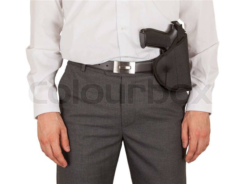 Secret service agent with a gun, isolated on white, stock photo