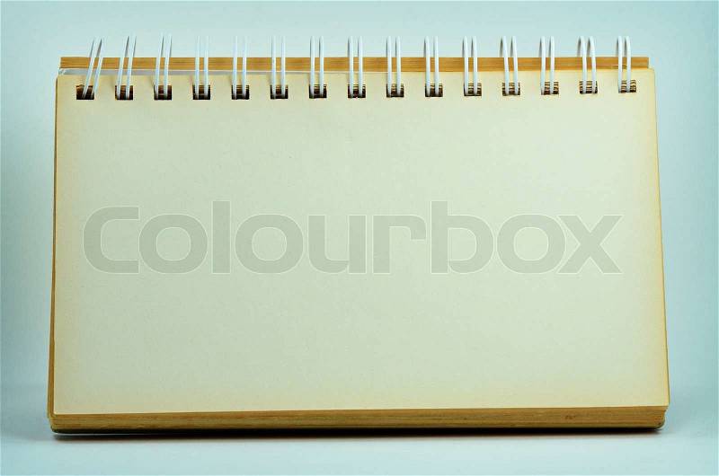 Blank brown paper page with binder standing, stock photo