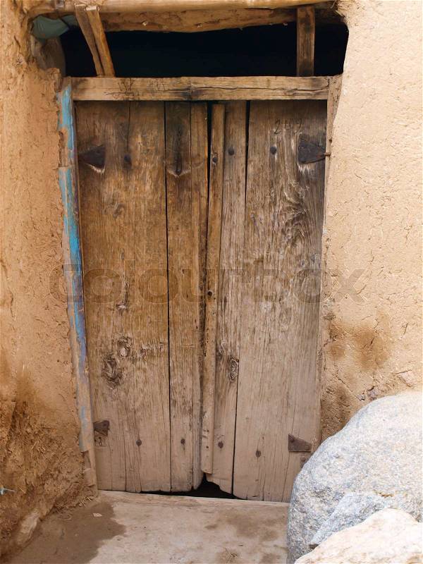 Old wooden doors in Kandovan village in Tabriz, Iran, stock photo