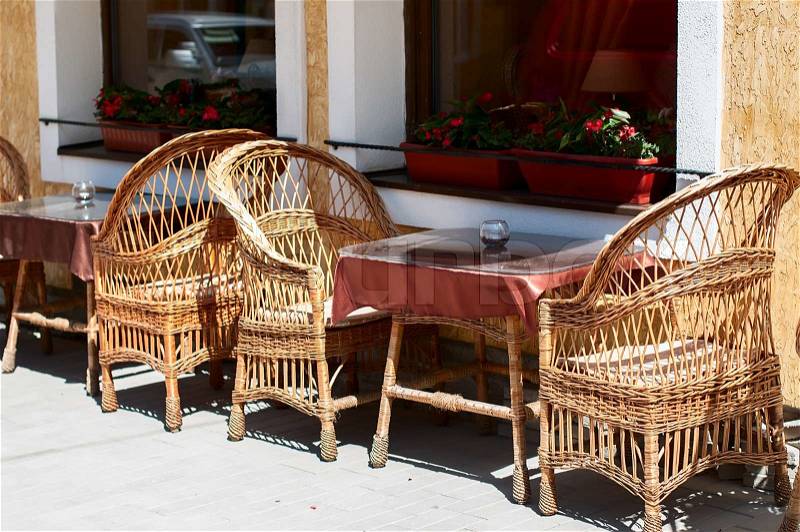 Cafe on the street, Wicker furniture made of twigs, stock photo