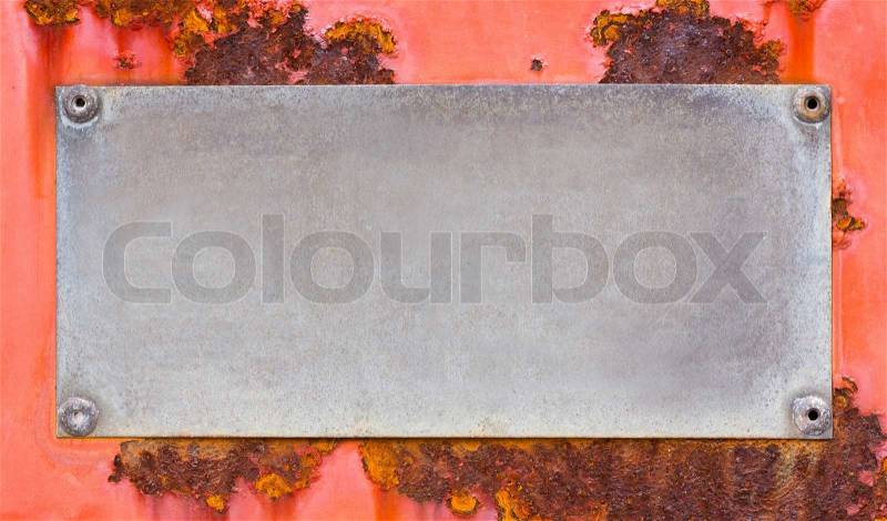Close up grunge name plate on red color rusty steel sheet, stock photo