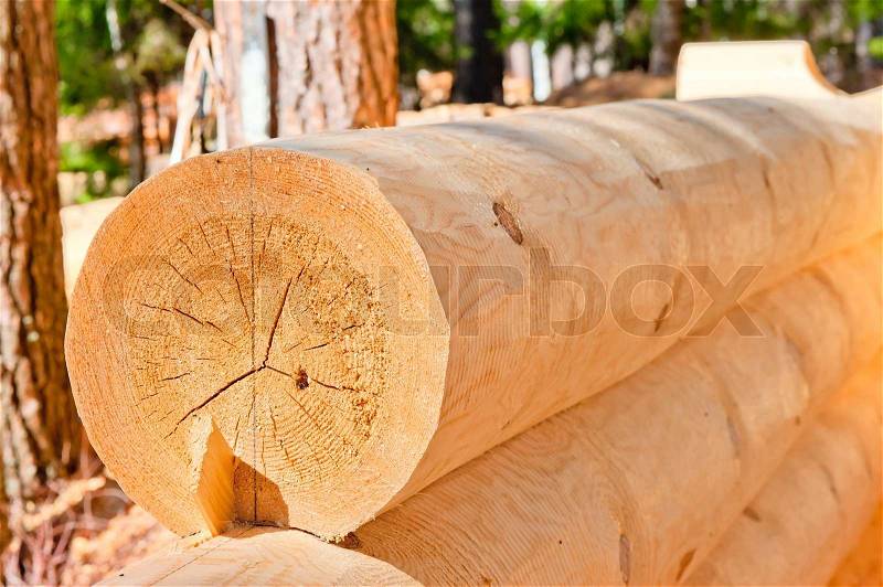 Rounded cross-section beam with a lower groove, stock photo