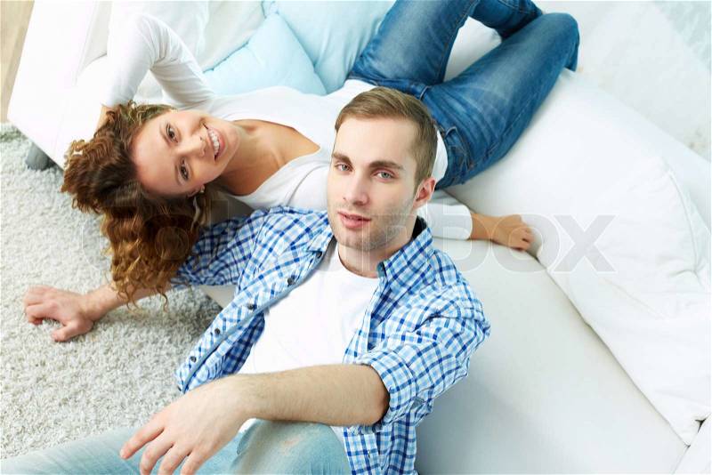 The above-view portrait of an attractive couple relaxing together, stock photo