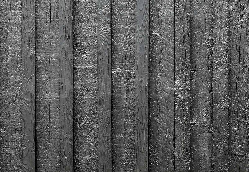 Background texture of old black painted wooden lining boards wall, stock photo