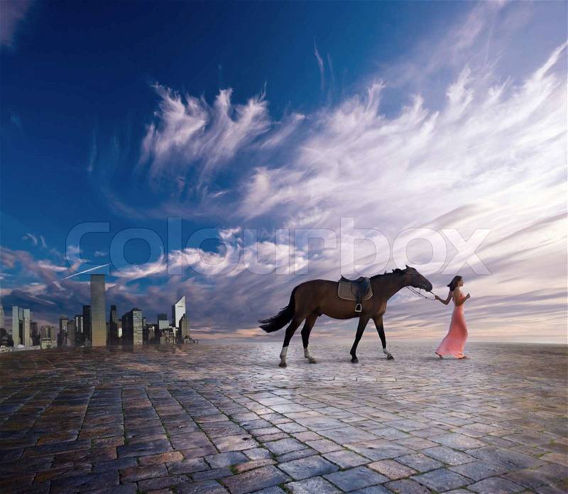 The young woman with a horse leave a city, stock photo
