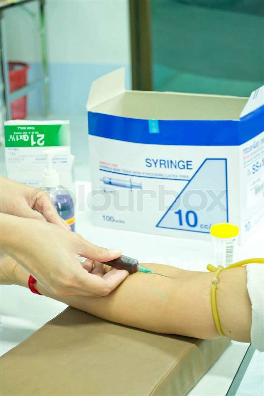Doctors Having Blood Test of patients to health, stock photo