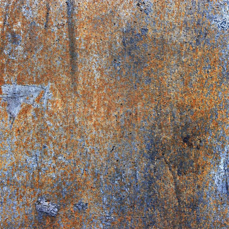 A rusty old metal plate with cracked black gloss paint. Old rusty black metallic background, stock photo