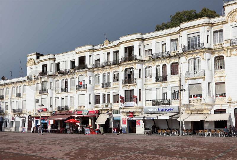 Cafes and shops at the waterfront buildings in Tangier, Morocco, stock photo