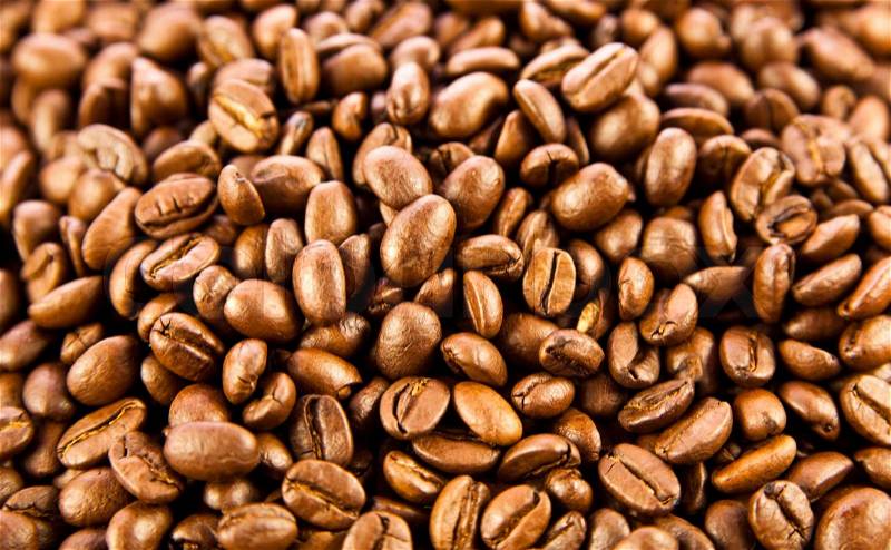 Brown coffee, background texture. roasted coffee beans. Brown coffee beans, close-up of coffee beans for background and texture, stock photo