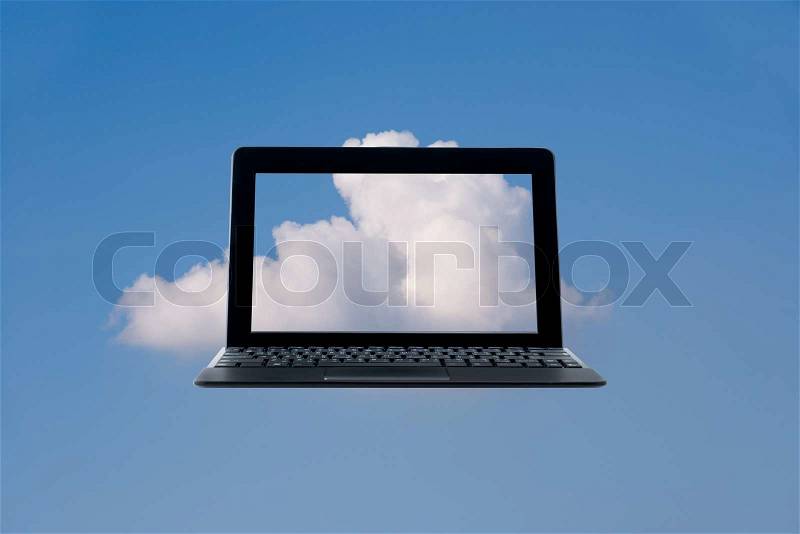 Laptop access to the clouds system, stock photo