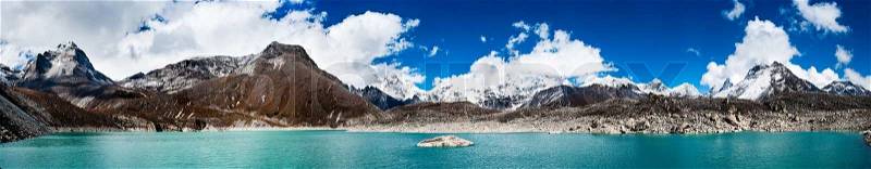 Himalaya panorama: sacred lake near Gokyo and Everest summit in the right part of the image. Travel to Nepal, stock photo