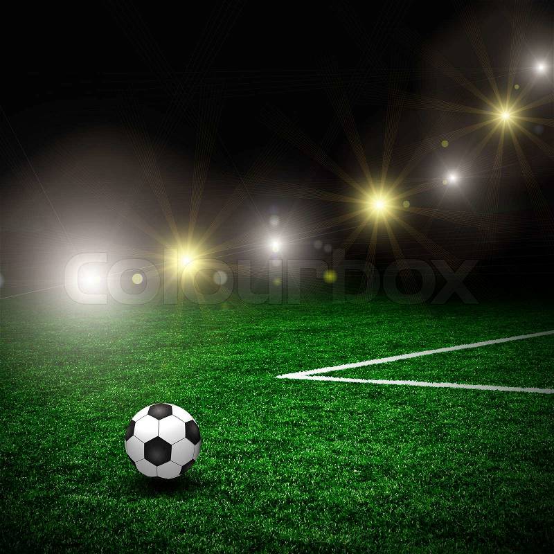 Soccer ball on the green field and lightning, stock photo
