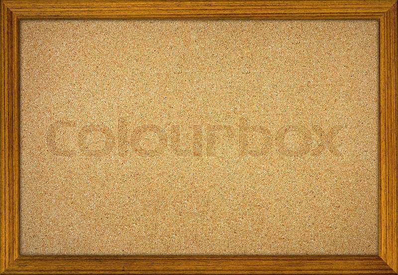 Empty office cork notice board with wood frame, stock photo