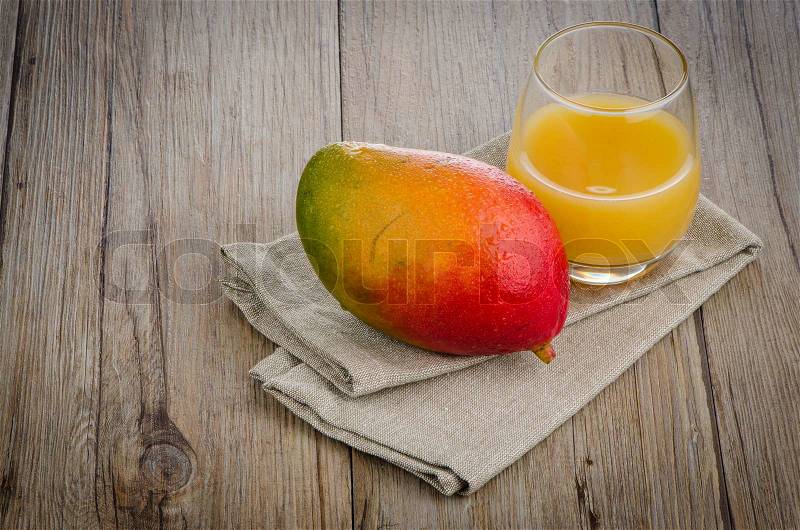 Fresh mango juice and mango fruit, stock photo