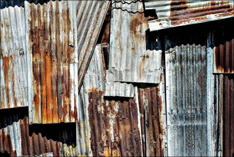 House made ​​of old rusty tin sheets, stock photo