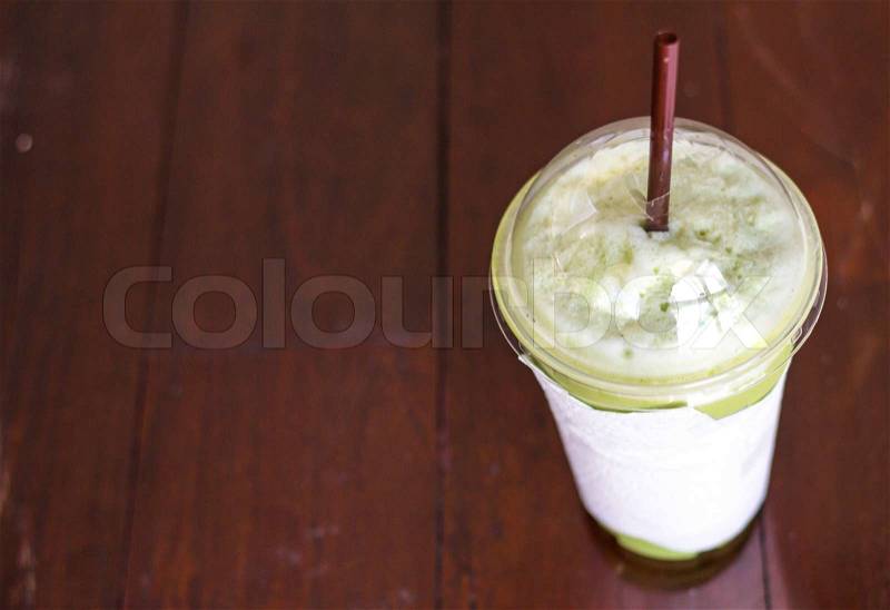 Iced green tea in the cafe, stock photo