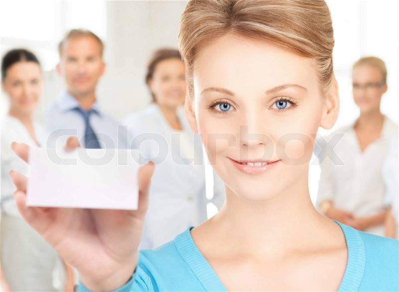 Happy woman with blank business or name card, stock photo