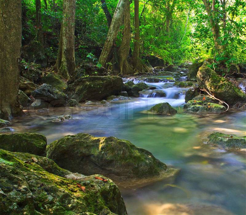 Waterfall and blue stream in the forest Kanjanaburi Thailand, stock photo