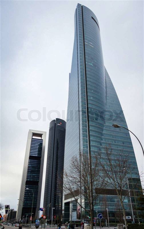 MADRID, SPAIN - MARCH 10 Cuatro Torres Business Area CTBA, in Madrid, Spain, on March 10, 2013. View of Glass Tower, PwC Tower and Bankia Tower skyscrapers, stock photo