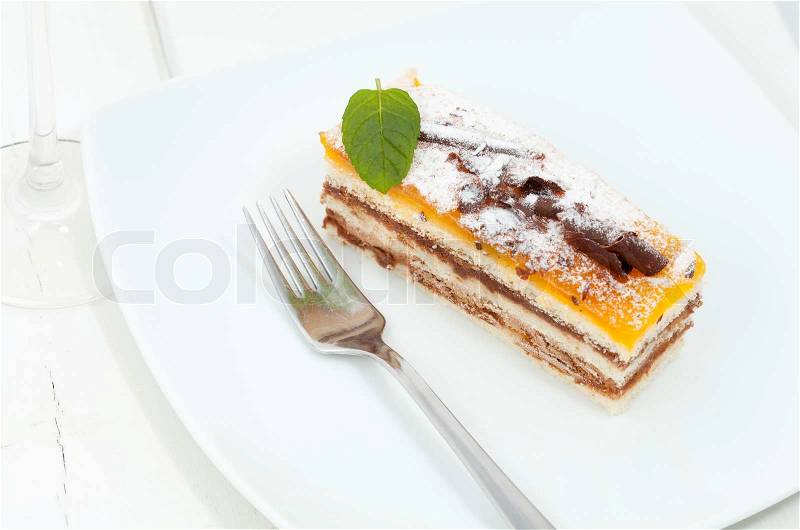 Delicious piece of chocolate cake with yolk, stock photo