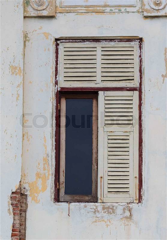 Abandoned White Wooden Window on Old White Wall, stock photo