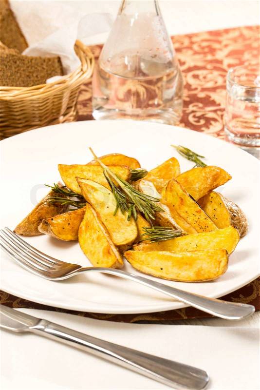Baked potatoes on the table in a restaurant, stock photo