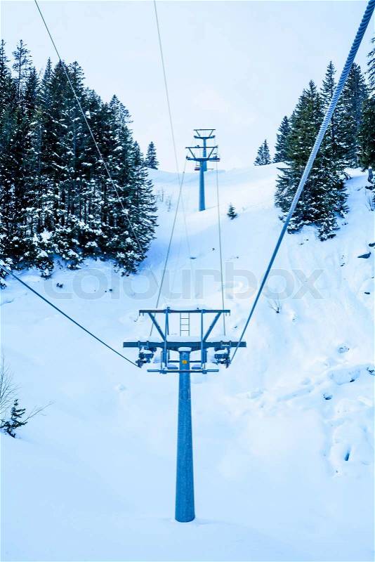 Ski lift with chairsLift to the top of the mountain at ski resort, stock photo