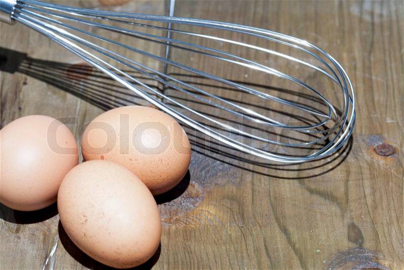 Stainless Whisk eggs with fresh, stock photo