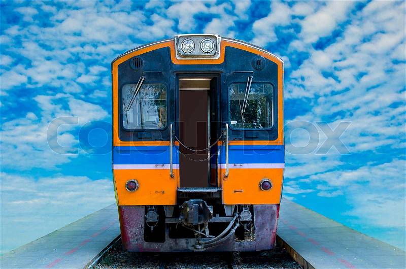 Diesel locomotive train isolated on blue sky background, stock photo