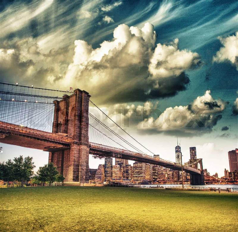 The Brooklyn Bridge as seen from Brooklyn Bridge Park, New York City - Sunset summer view, stock photo