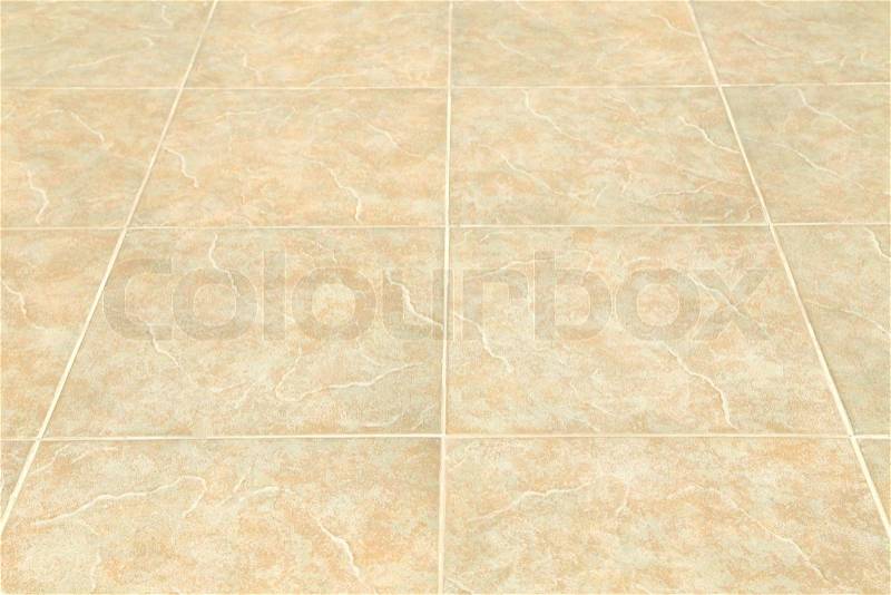 Brown ceramic floor tiles closeup texture. Background, stock photo
