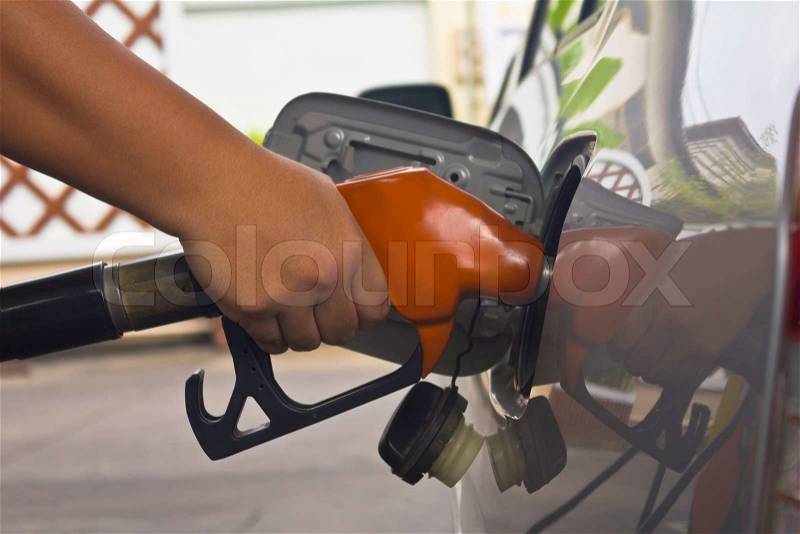 Fill up fuel at gas station, stock photo