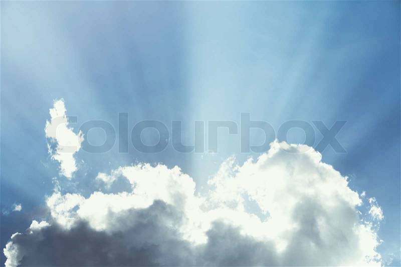 Sun burst, surreal sun rays with cloud, stock photo