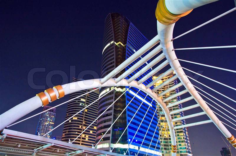 Buildings bridge at train station in big townbusiness area , buildings in the city of bangkok, stock photo