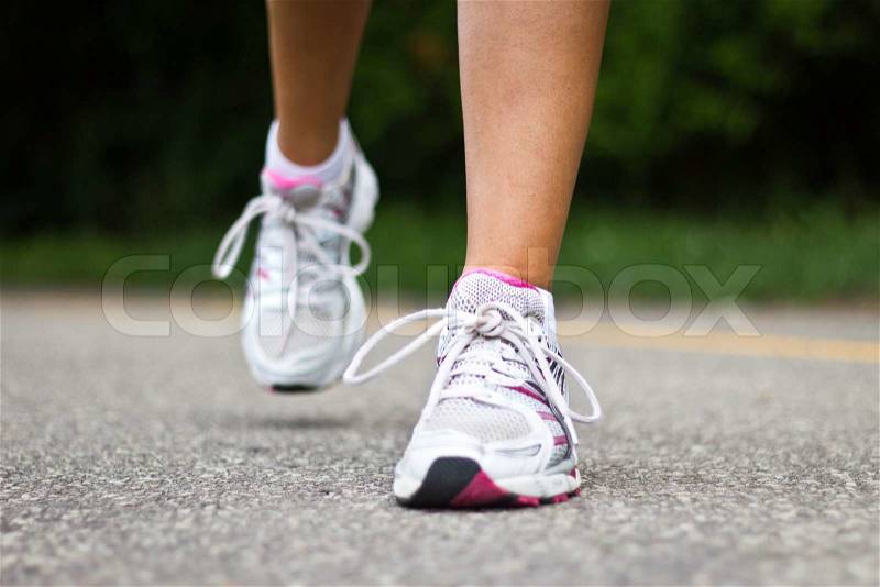 Running shoes close-up. Female runner, stock photo