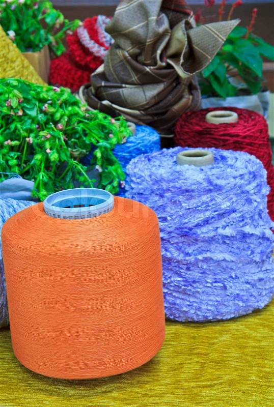 Embroidery colorful thread spool in rows, stock photo