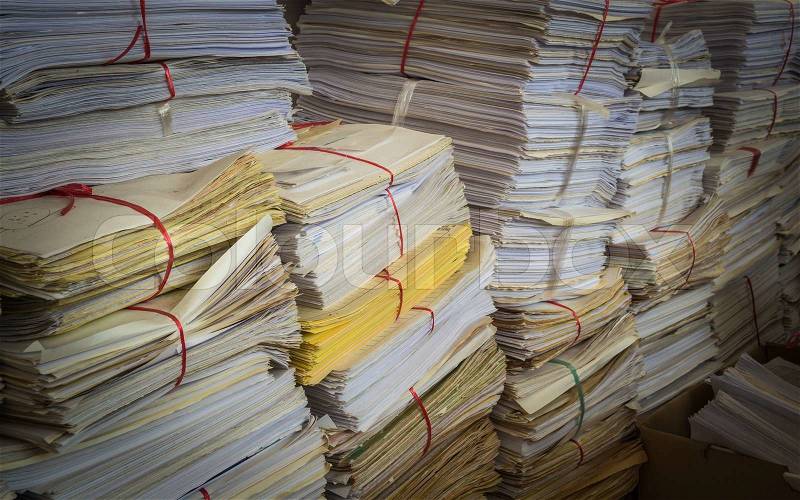 A pile of used paper are tied, stock photo