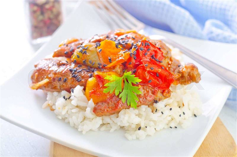 Boiled rice with meat and vegetables, stock photo