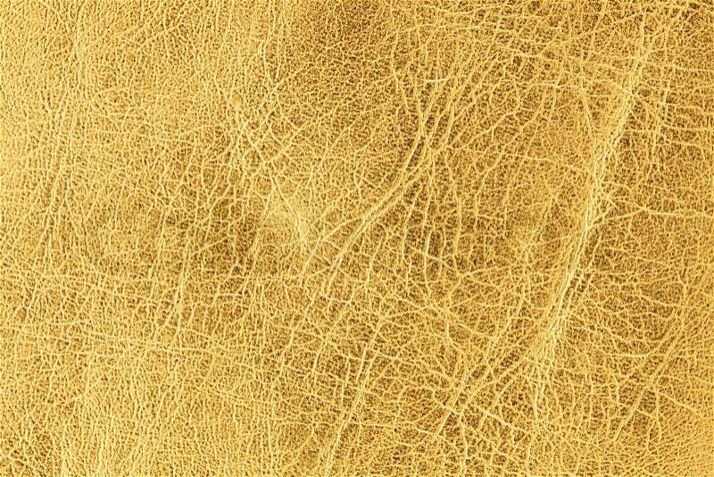 Close up shot of gold leather texture background, stock photo