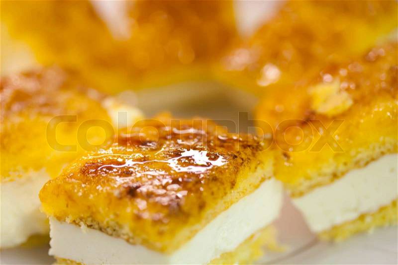 Delicious homemade cake with toasted yolk cream, stock photo