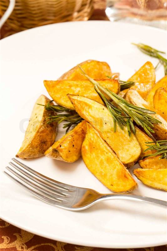 Baked potatoes on the table in a restaurant, stock photo