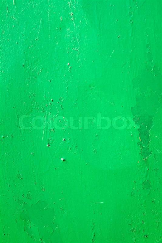 Metal background painted with green paint, stock photo