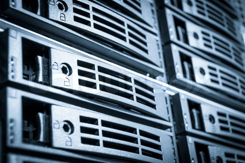Close-up of hard drives in data center, stock photo